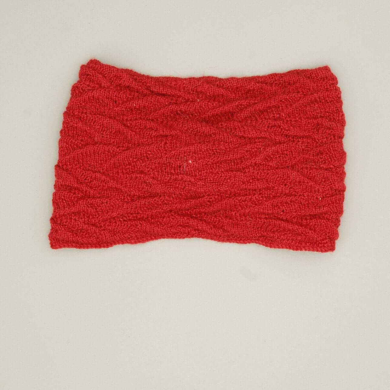 Alpaka Stirnband Damen aus 100% Babyalpaka in Rot, ideal für kalte Tage. Jetzt alpaka stirnband kaufen.
