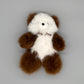 Alpaka Kuscheltier Teddybär aus Baby Alpakawolle in Braun und Weiß, besonders weich und kuschelig.
