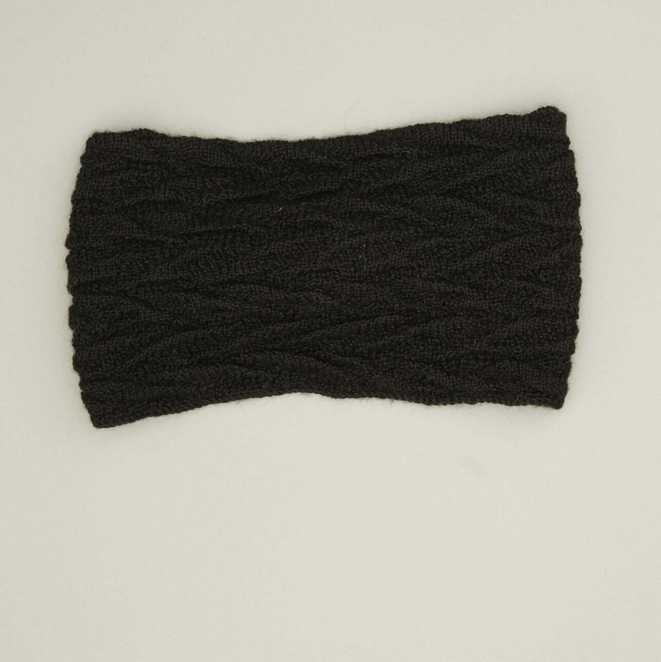 Stylisches Alpaka Stirnband Damen aus 100% Babyalpaka in Schwarz - perfekt für kalte Tage. Jetzt alpaka stirnband kaufen!