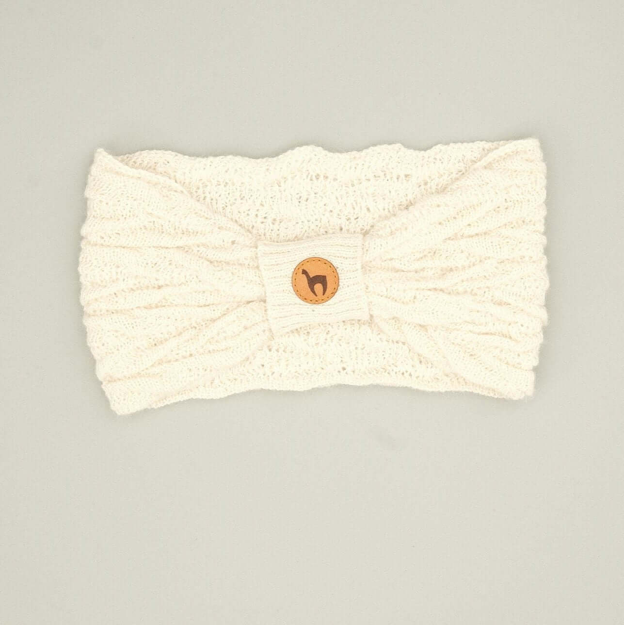 Alpaka Stirnband kaufen: Damen Stirnband aus 100% Babyalpaka mit Knotendetail in Beige