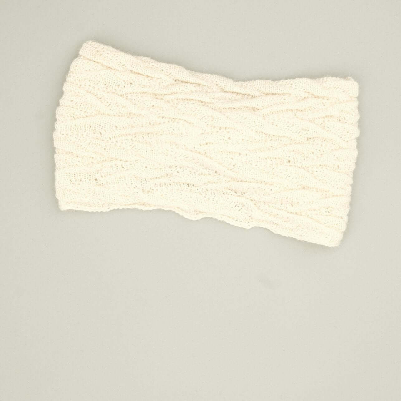 Alpaka Stirnband Damen aus 100% Babyalpaka mit Knotendetail in Cremefarben, perfekt für kalte Tage, alpaka stirnband kaufen.