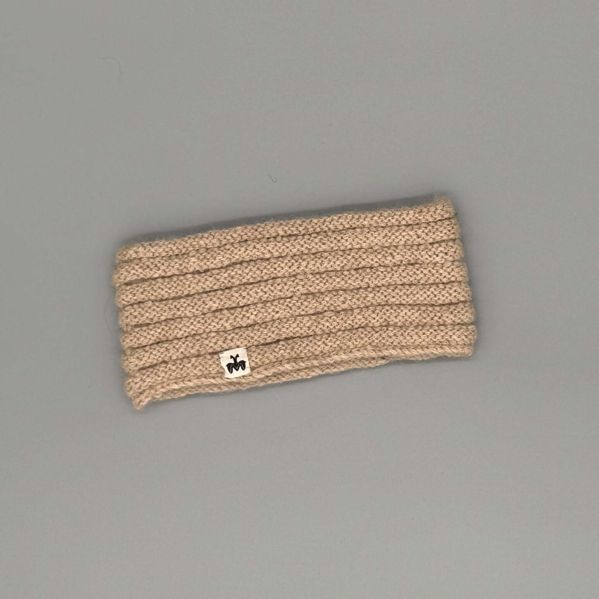 Alpaka Stirnband aus 100% Baby Alpaka in Röllchenmuster, extra warm und weich für kalte Tage.