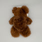 Alpaka Kuscheltier Teddybär aus Baby Alpakawolle in Braun und Weiß, flauschig und sanft.