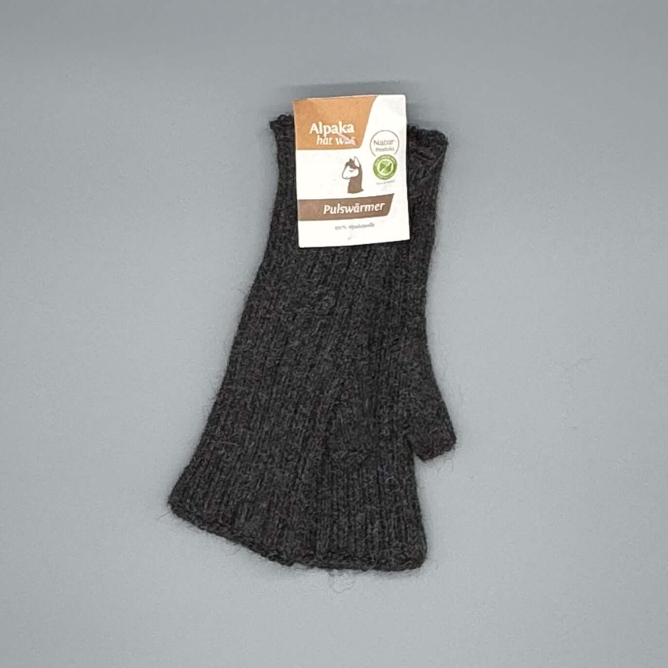 Alpaka Pulswärmer 100% Alpakawolle – hochwertige, warme Stulpen mit Daumenloch in dunkler Farbe.