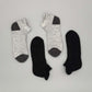 Alpaka Sportsocken mit Fersenschutz in Schwarz und Grau, atmungsaktiv und hautfreundlich, ganzjährig geeignet.